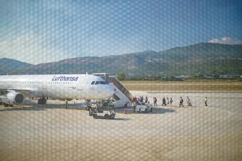 Through the glass window view of Split international airport runway in Spli.. Stock Photos