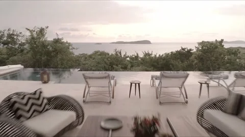 Through the house - drone flies through house and out to beach Stock Footage