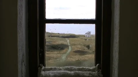 Through a old lighthouse window Stockbeeldmateriaal 46477366