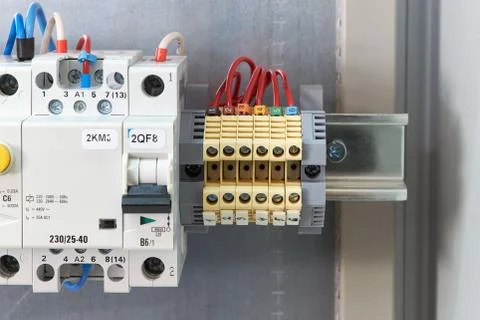 Through terminals, circuit breaker, modular contactor and RCD. Stock Photos