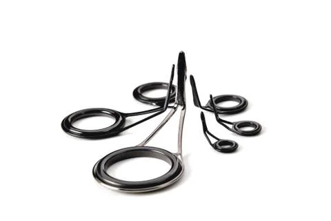 Throughput rings for fishing rods of various sizes close-up space for an insc Stock Photos