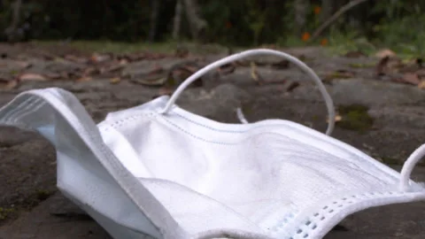 Throw Away Face Mask Close Up Stock Footage 150075421