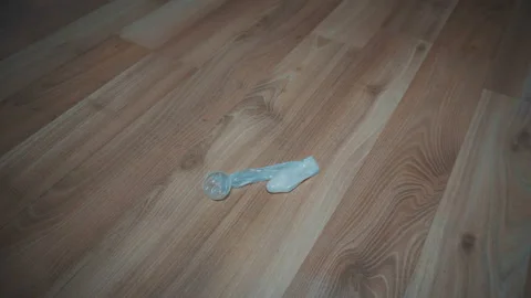 Throw away used condom on the floor 動画素材 97143318