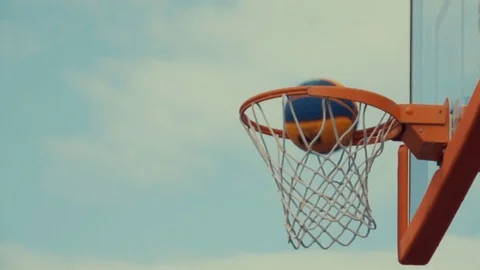 Throw a basketball in the basket. Stock Footage 127857045
