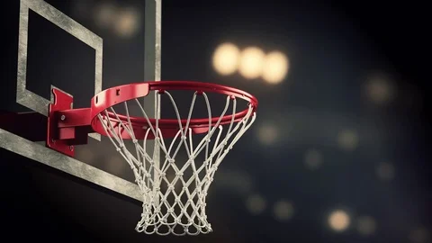 A throw in a basketball ring on the background of yellow spotlights Stock Footage 75546698