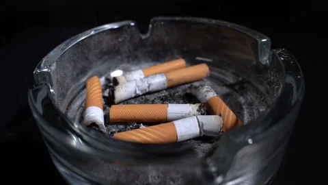 Throw a butt in an ashtray Stock-Footage 119277818