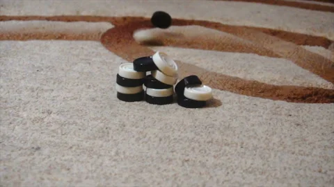 Throw checkers into a pyramid of checkers, a game called Chapaev Stock Footage 85603371
