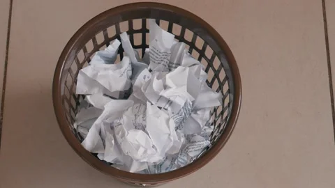 Throw crumpled paper into the trash. Top view Stock Footage 105795915
