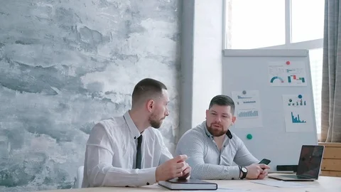 Throw documents and documents in honor of the victory in the negotiations Stock Footage 125634757