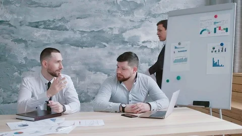 Throw documents and documents in honor of the victory in the negotiations Stock Footage 125635658