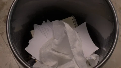 Throw garbage in the trash Stock Footage 125432970