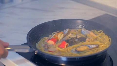 Throw the pan with seafood paste Stock Footage 111670735