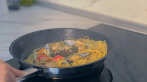 Throw the pan with seafood paste Stock Footage 111671306