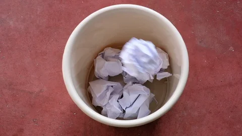 Throw paper in the waste basket. concept for business frustration, stress Stock Footage 119315295