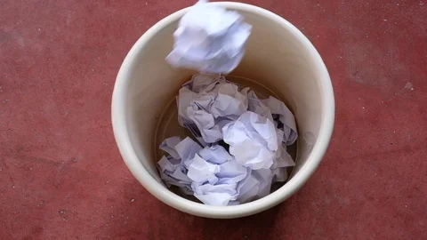 Throw paper in the waste basket. concept for business frustration, stress Stock Footage 119315328