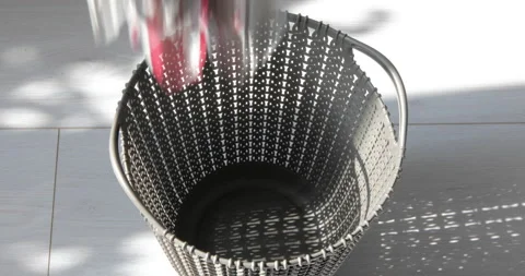 Throw papers into plastic trash can Stock Footage 112695664