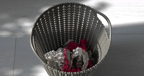 Throw papers into plastic trash can Stock Footage 112708988