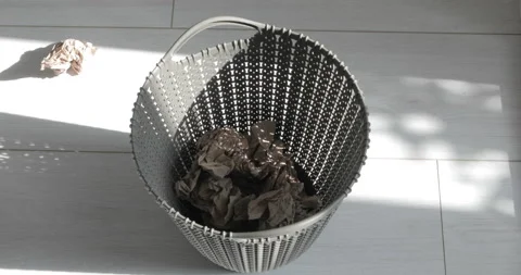 Throw papers into plastic trash can Stock Footage 112709168