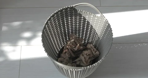 Throw papers into plastic trash can Stock Footage 112709550