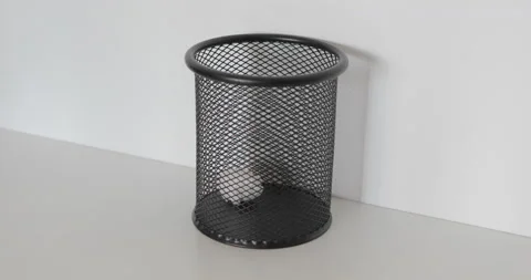 Throw papers into plastic trash can Stock Footage 113766065