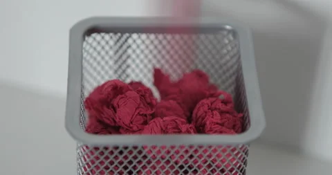 Throw papers into plastic trash can Stock Footage 113767877