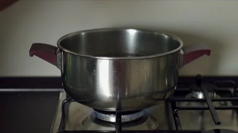 Throw pasta into boiling water Stock Footage 55253626
