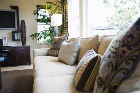 Throw pillows on sofa Stock Photos