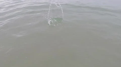 Throw a stone into the sea 스톡 동영상 48567423