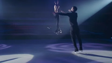 Throw technique in pair figure skating.Skaters make compulsory element, slow Stock Footage