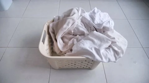 Throw white bedding in a drawer. concept of housework. Video stock 131468233