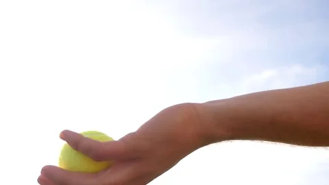 Throwing and catching a ball, slow motion Stock Footage 74630349