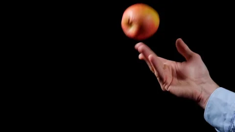 Throwing an apple Stock Footage 98235503