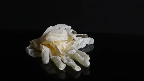 Throwing away disposable gloves Stock Footage 127513592