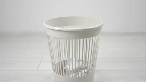 Throwing away multiple books into trash bin. Outdated literature. 库存影片 130713779