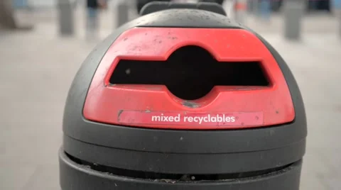 Throwing away rubbish into a bin Stock Footage 57285134