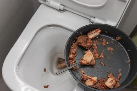 Throwing away a stinky dish Photos