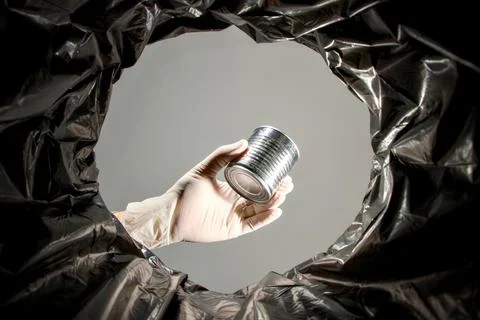 Throwing away tin can Stock Photos