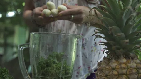 Throwing bananas in a blender 1 Stock Footage 43132034