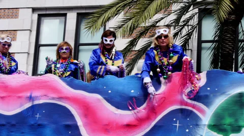 Throwing Beads from a Mardi Gras Parade Float 4098 Stock-Footage 35796379