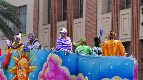 Throwing Beads from a Mardi Gras Parade Float 4092 Stock Footage 35796710