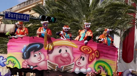 Throwing Beads from a Mardi Gras Parade Float  Stock Footage 35796727