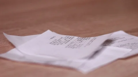 Throwing bills on the table Stock Footage 84676528