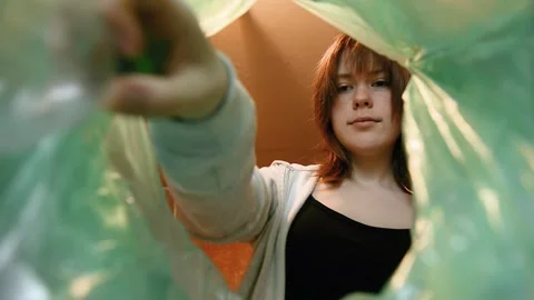 Throwing bottle into trash low angle video 스톡 동영상 336684968