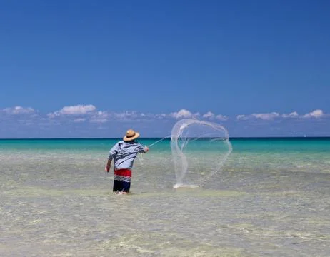 Throwing a cast net 写真素材