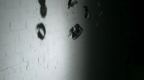 Throwing clock on the wall, Slow Motion Video stock 31819533