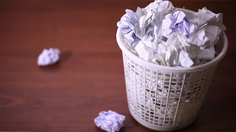 Throwing crushed paper into overfull garbage can Stock Footage 58029097