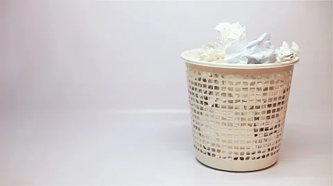 Throwing crushed paper into overfull garbage 스톡 동영상 58310127