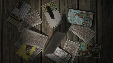 Throwing a deck of tarot cards onto a table. Knight of Cups in the center Stock Footage 148795387