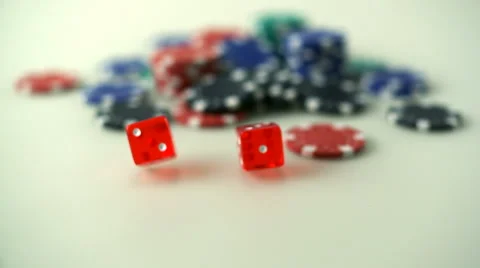 Throwing dice in front of casino chips, Slow Motion Stock Footage 41847677