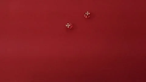 Throwing the dice. Red cubes with white dots on red background Stock Footage 326243173
